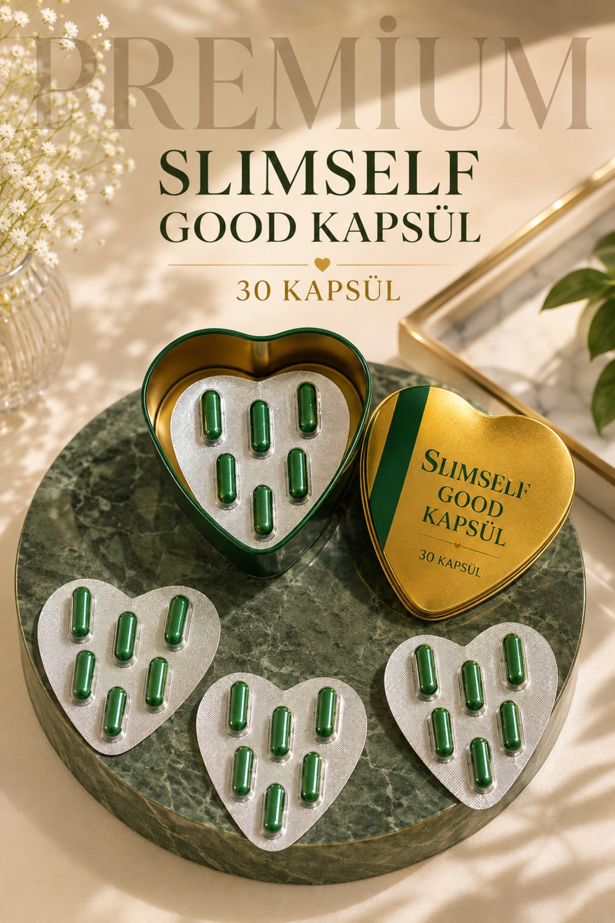 Slimself Good Kapsül altın kalp kapağı ve blisterler mermer zemin üzerinde premium sunum